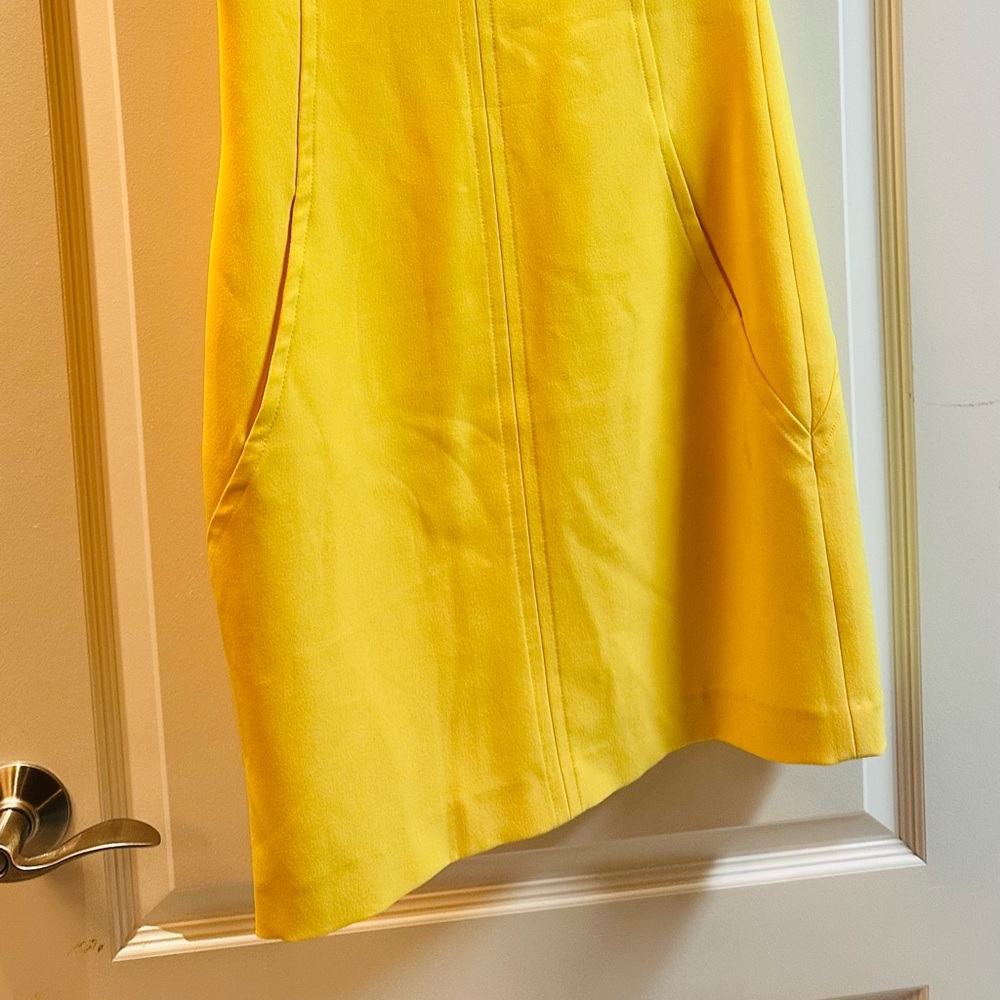 Beautiful summer dress in yellow .